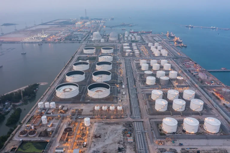 Aerial view of petrochemical oil refinery and sea