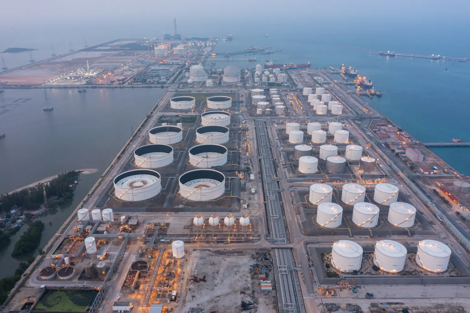 Aerial view of petrochemical oil refinery and sea